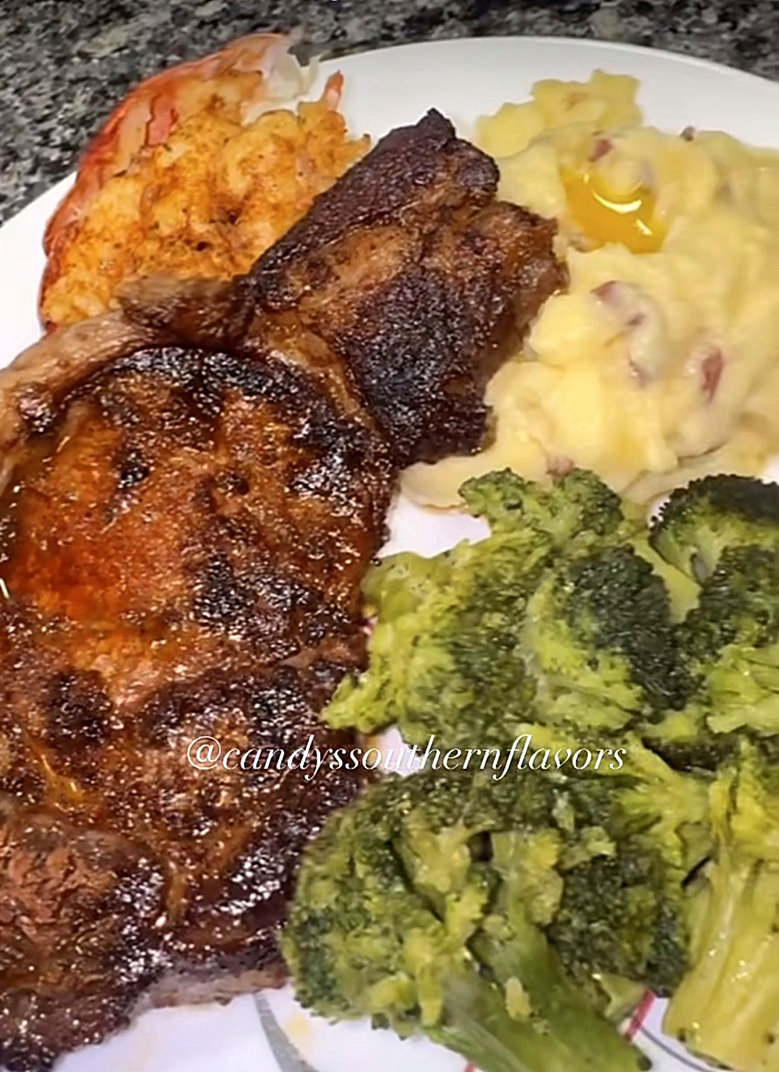 Pan-seared steak with lobster tail, mashed potatoes and broccoli